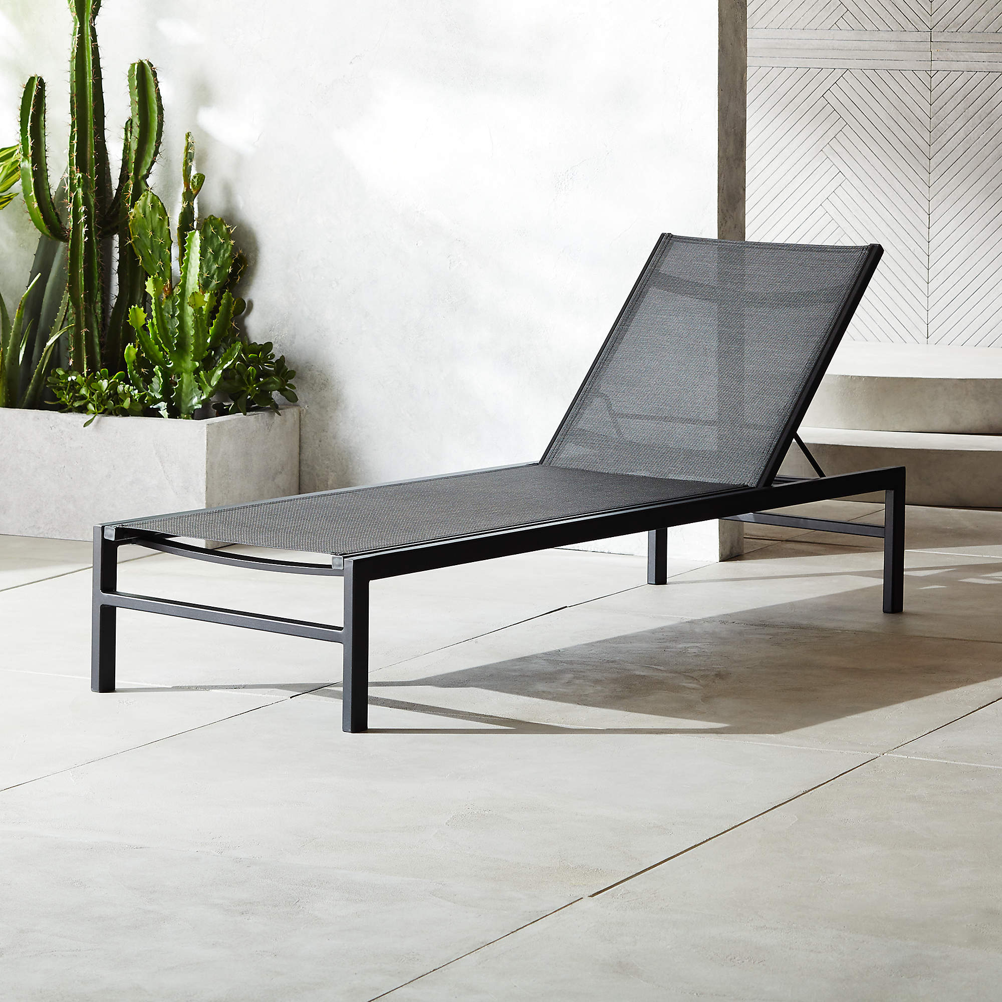 An application scenario or product detail of black outdoor chaise lounge chair - Image 6