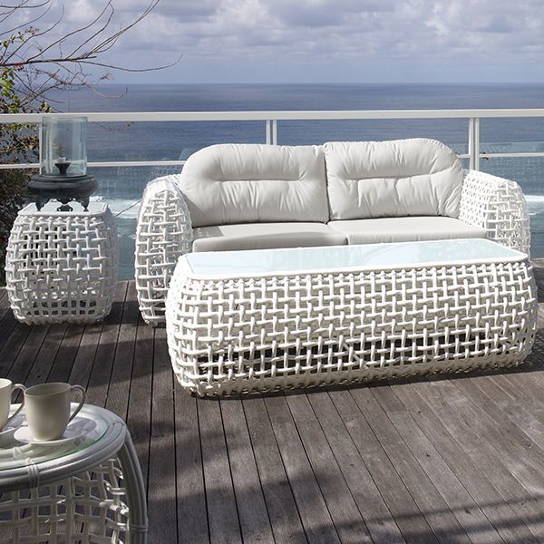 An application scenario or product detail of outdoor white wicker sofa - Image 1
