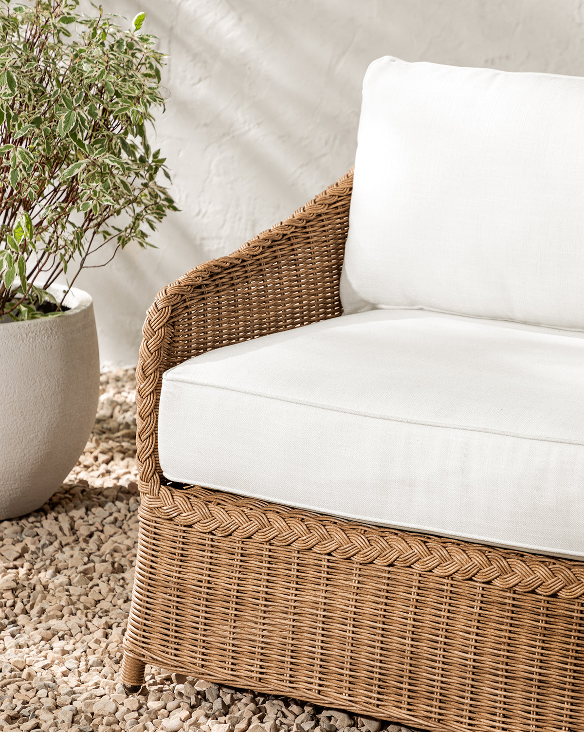 An application scenario or product detail of outdoor white wicker sofa - Image 9