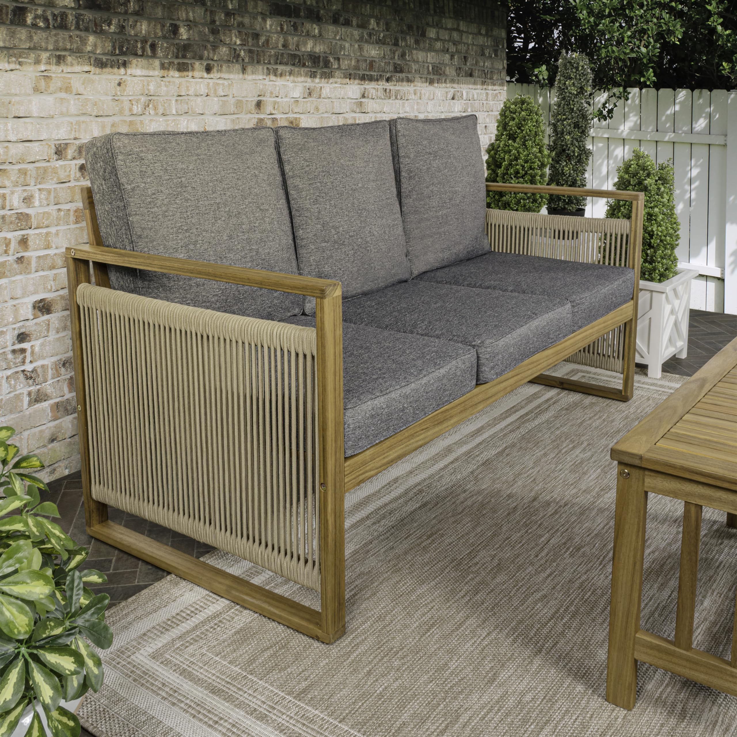 An application scenario or product detail of outdoor wood sofa - Image 1