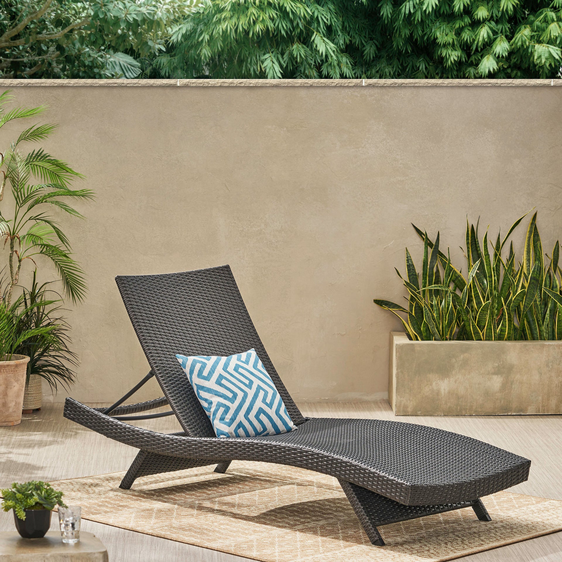 An application scenario or product detail of wicker outdoor chaise lounger - Image 9